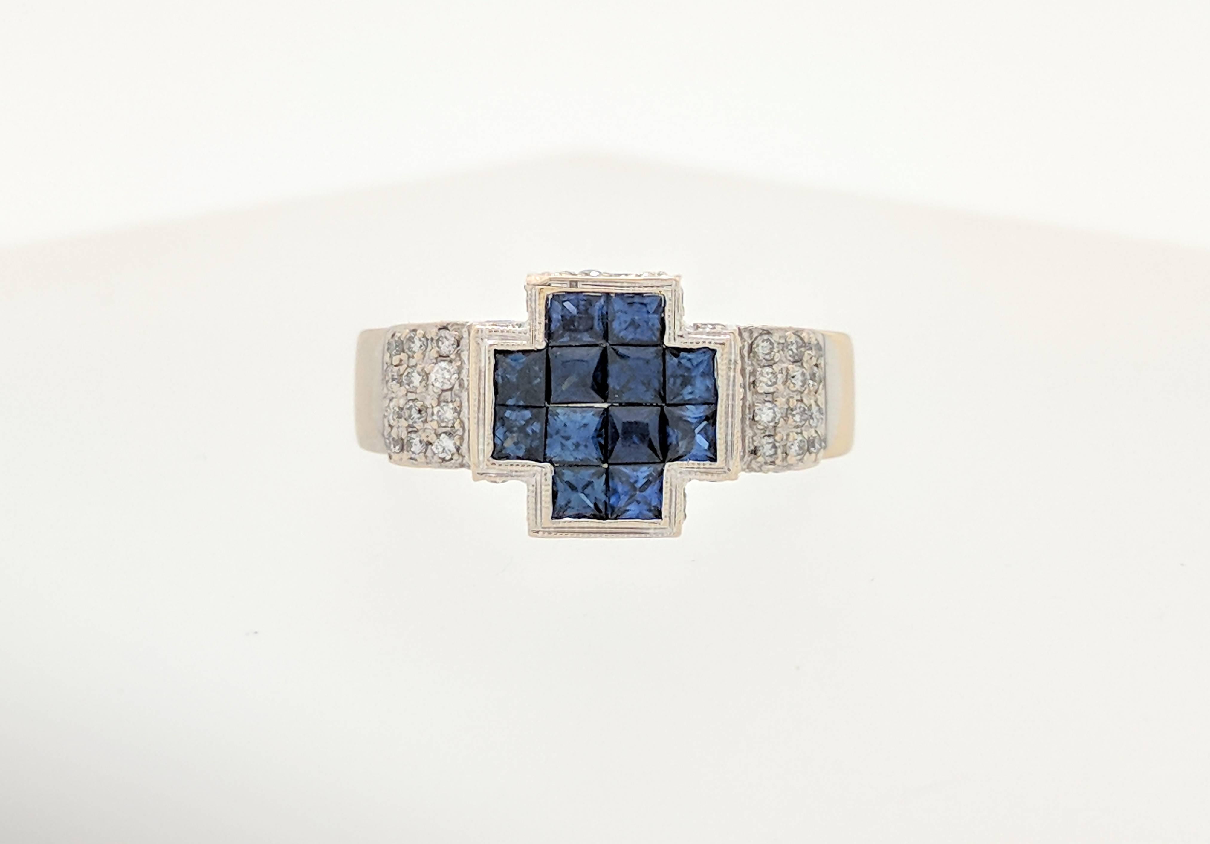  18K White Gold Illusion Set Sapphire & Diamond Cross Ring

You are viewing a beautiful ladies illusion set sapphire & diamond cross ring. This ring is crafted from 18k white gold and weighs 10.7 grams. It features twelve 12 .15ct natural princess