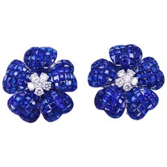 Clips d'oreilles en or blanc 18 carats avec saphir invisible et diamants