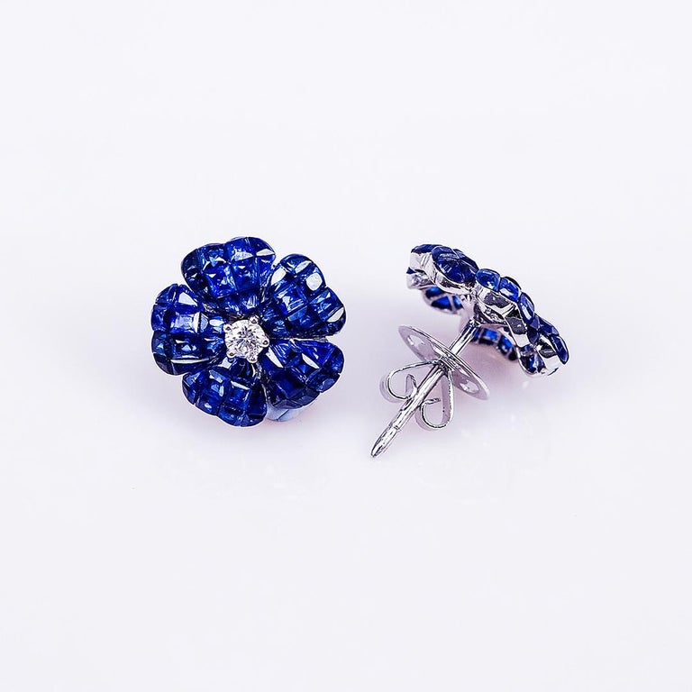 Modern 18 Karat White Gold Invisible Sapphire Flower Stud Earrings For Sale