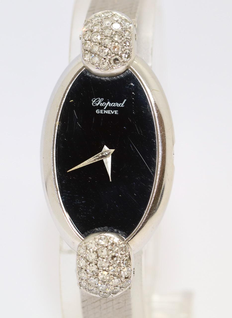 18 Karat White Gold Ladies Wrist Watch by Chopard, with Diamonds

!Crown missing and glass scratched!
Watch is sold as DEFECTIVE! Watch can be worn as a piece of jewelry or taken to Chopard for repair.

Only suitable for small wrists.

Includes
