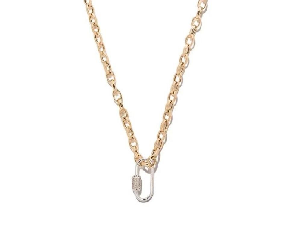 This is a carabiner like no other. It is crafted in solid 18kt gold, embellished with sparkling pave diamonds and designed to be worn around your neck. It will never fail to impress your exquisite style.