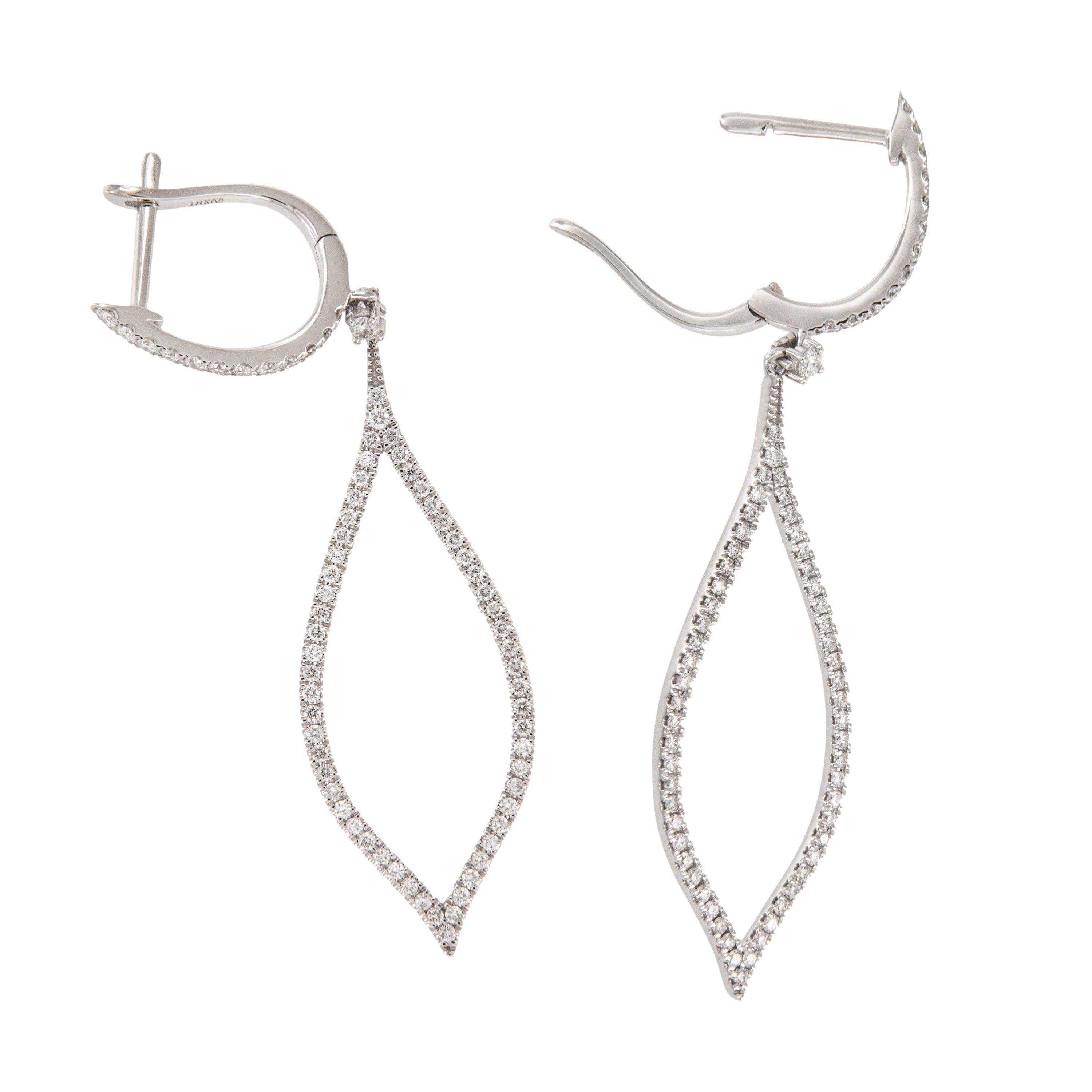 Holiday sparkle? Check! These lovely diamond earrings are eye catching with 140 diamonds = 0.77 cttw swaying and catching the light with your every move! Earrings are drop style with comfortable huggie tops with no post poking your neck and graceful