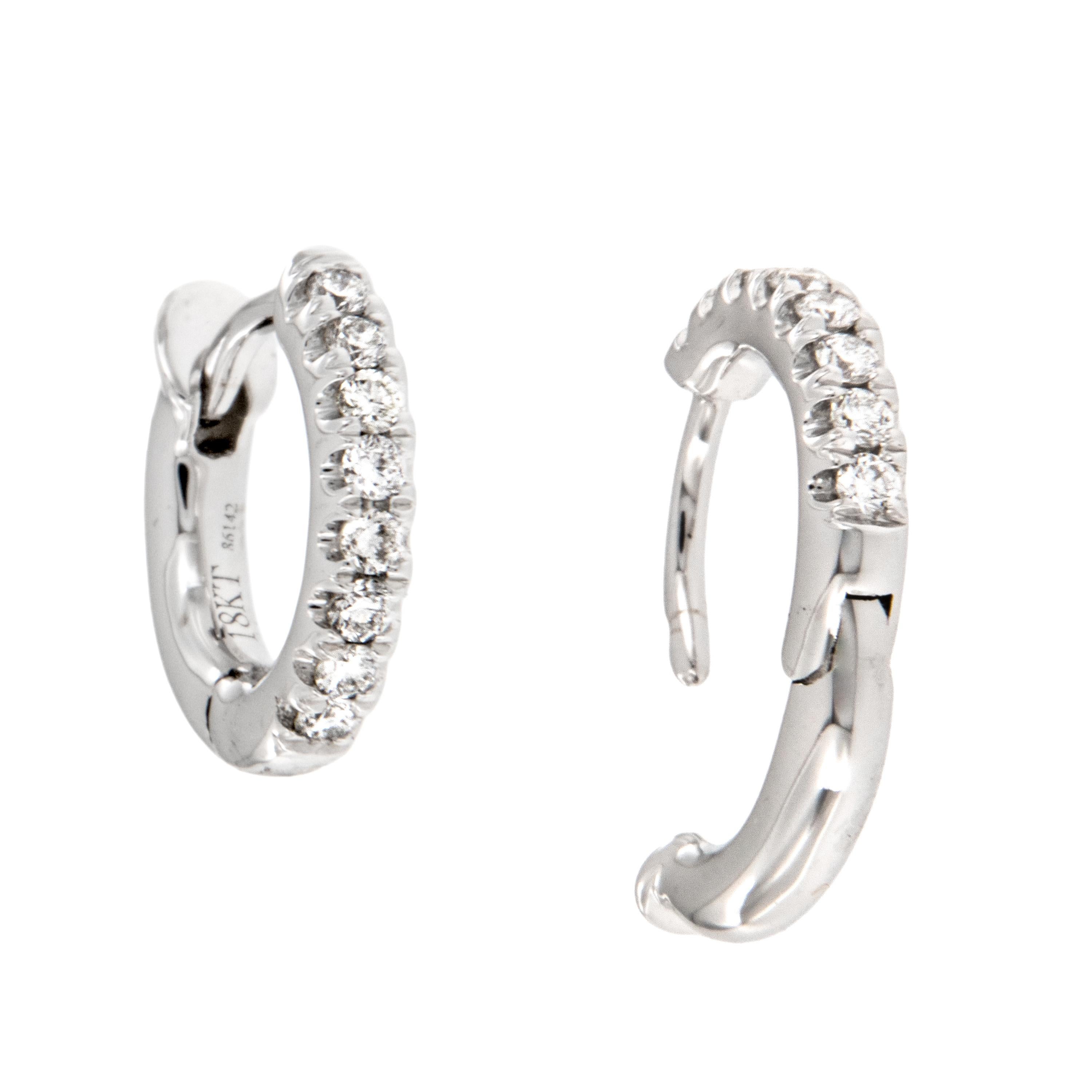 How adorable are these diamond hoop earrings? Perfect for you to wear every day or to the office, especially with no backing to poke your neck! Made from 18 karat white gold these mini diamond huggy hoops are set with 0.12 Cttw diamonds. They are