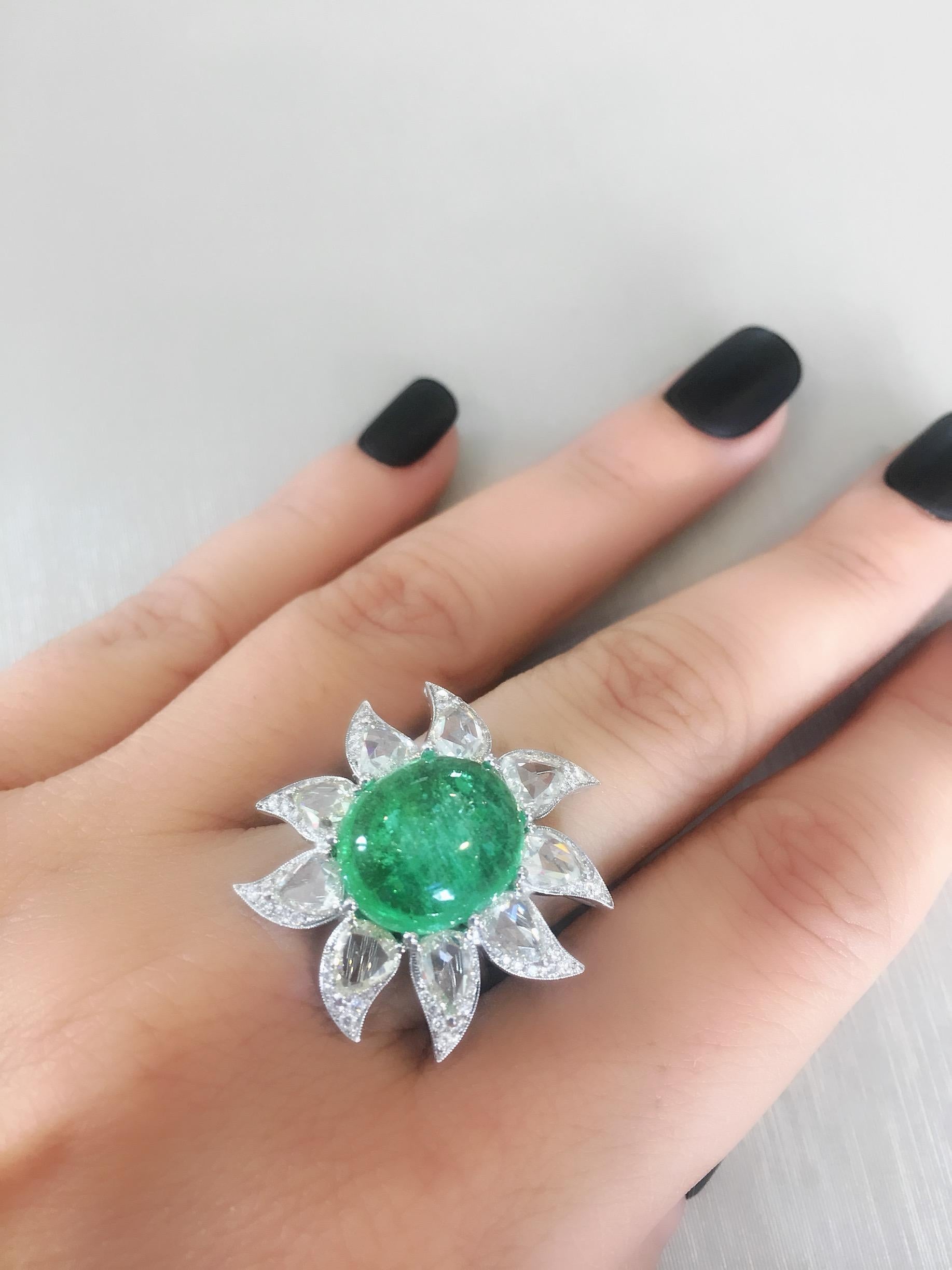 18 Karat White Gold ring from Paraiba Collection created by Monan with 8.45 carat paraiba tourmaline, 2.59 carats of pear-shaped rose cut diamonds and 68 brilliant cut diamonds with the total weight of 0.33 carats.                                   