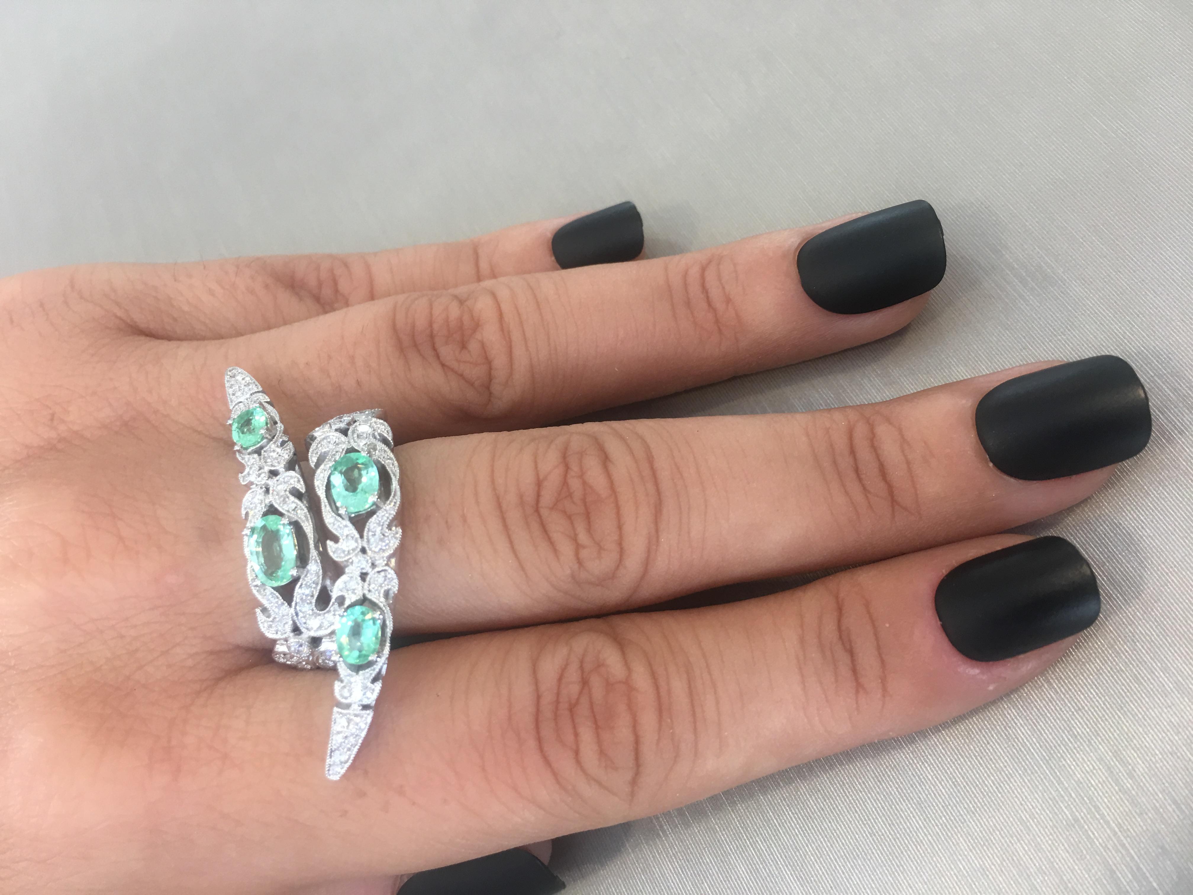 18 Karat white gold 'Maleficent Paraiba Ring' from Parahiba Collection created by Monan with 1.46 carats of paraiba tourmalines and 104 brilliant cut diamonds with the total weight of 1.46 carats.
Fingers size 53 (Europe) = 6.5 (US) = M 1/2 (UK) 
