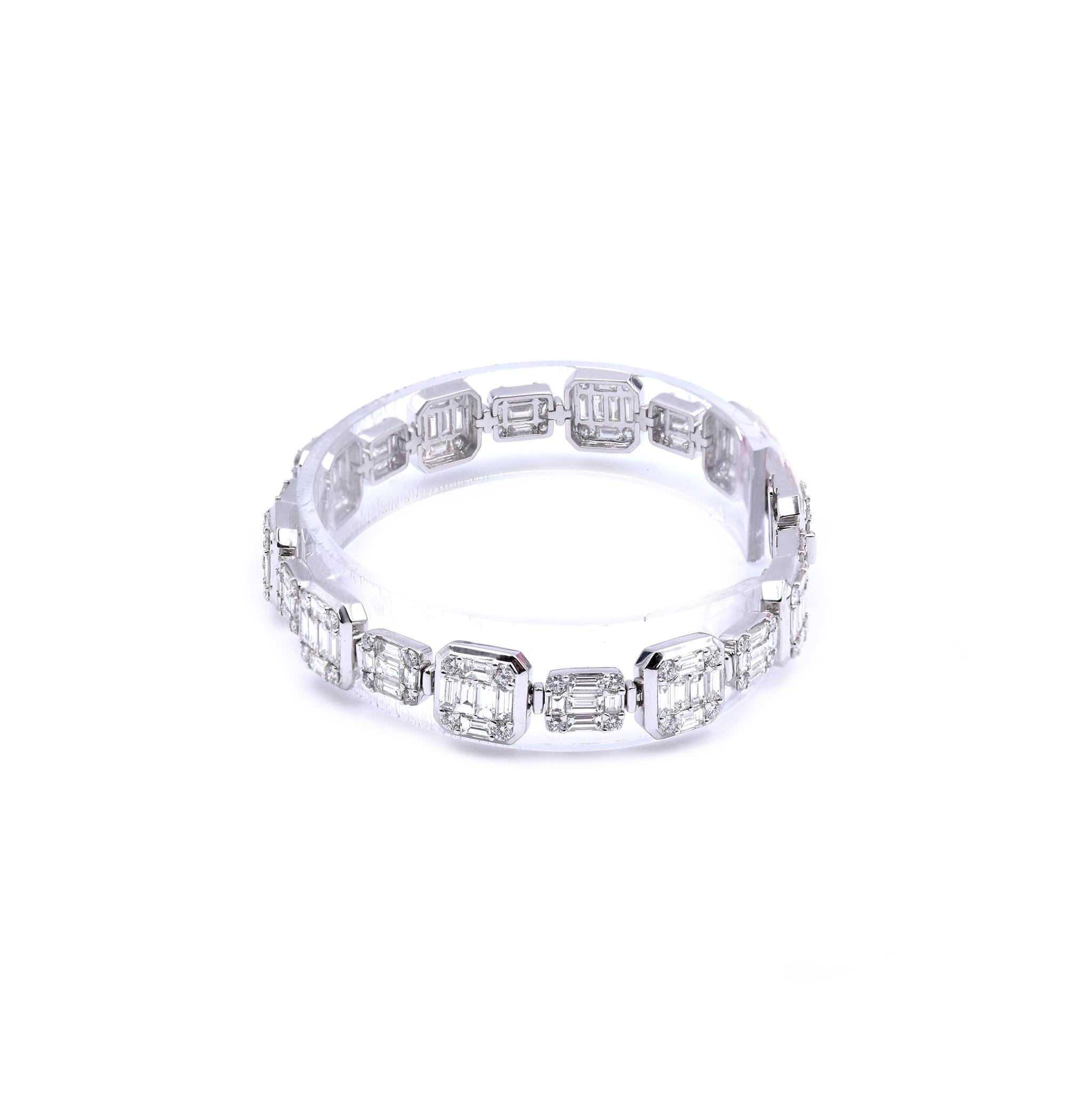 Designer: custom
Material: 18K white gold
Diamonds: 80 round brilliant cut = 1.94cttw
Color: G
Clarity: VS2
Diamonds: 110 baguette cut = 8.25cttw
Color: G
Clarity: VS2
Dimensions: bracelet will fit up to a 7-inch wrist
Weight: 22.26 grams
