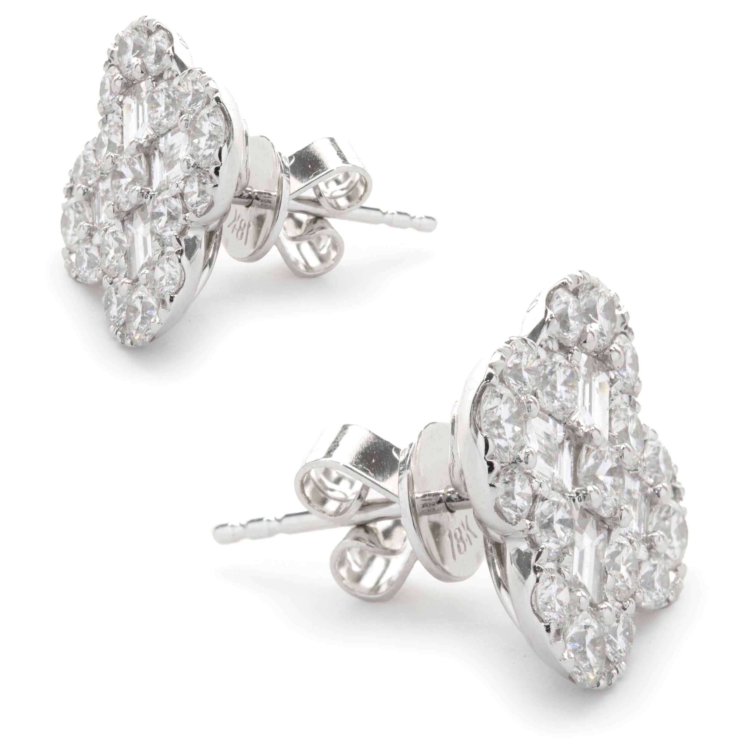 Designer: custom
Material: 18K white gold
Diamond: 8 baguette cut = 0.69cttw
Color: G
Clarity: SI1
Diamond: 34 round brilliant cut = 1.52cttw 
Color: G
Clarity: SI1
Dimensions: earrings measure 14.40mm in length
Fastenings: post with friction