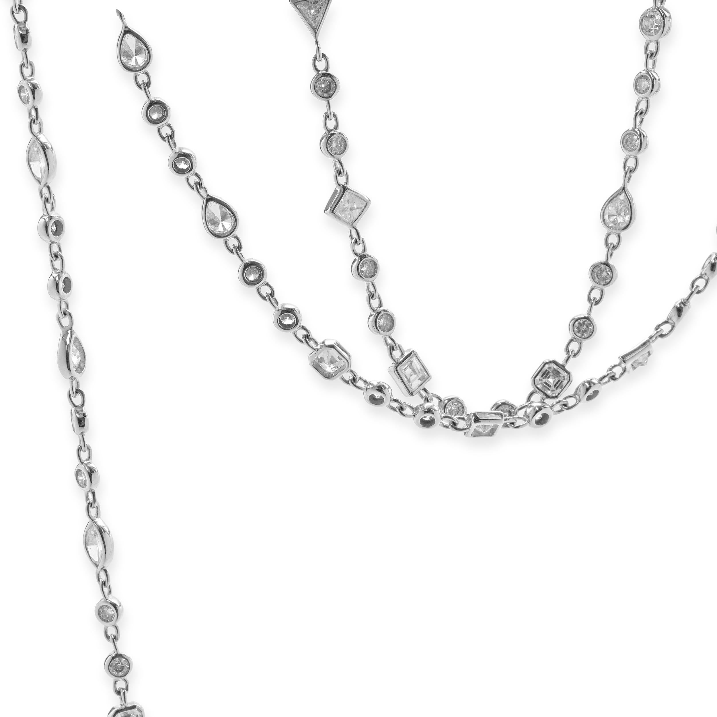 Designer: custom
Material: 18K white gold
Diamonds: 180 multi cut = 6.00cttw
Color: G
Clarity: VS2-SI1
Dimensions: necklace measures 36-inches in length 
Weight: 14.02 grams


