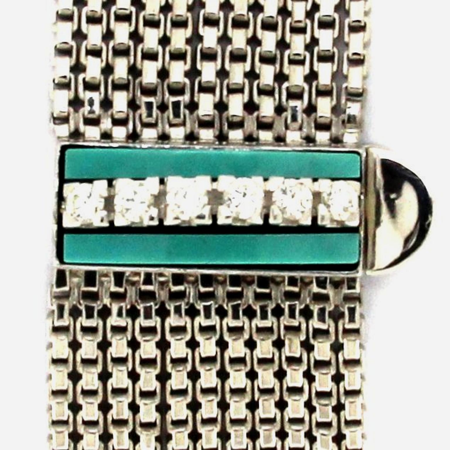 18 Karat White Gold multichain Bracelet with diamonds and turquoise

Total weight of gold 18 kt gr 58.00
24 white diamonds total carats 0.96 
4 turquoise motifs 
