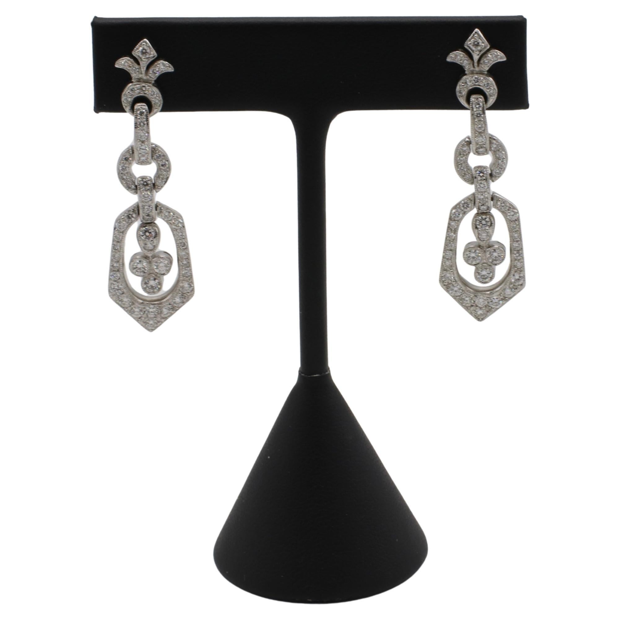 18 Karat White Gold Natural Diamond Chandelier Dangle Drop Earrings 
Metal: 18k white gold
Weight: 12.16 grams
Diamonds: Approx. 2.00 CTW G-H VS natural round diamonds
Length: 1.75 inches
Width: 0.5 inch
RDDD 111183-5
