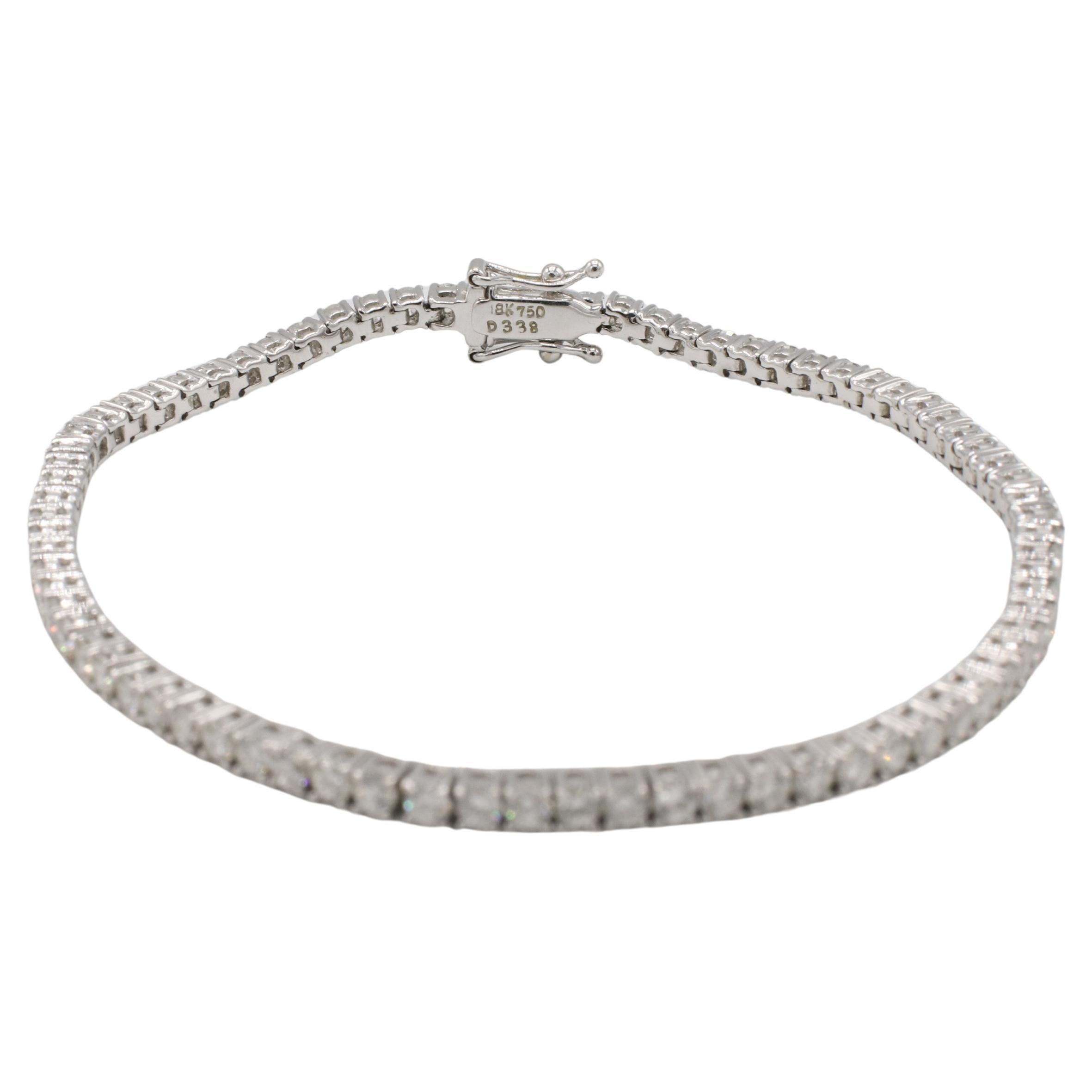 18 Karat Weißgold Natürliche 3,38 Karat Diamant Tennis Line Armband 
Metall: 18k Weißgold
Gewicht: 8,68 Gramm
Diamanten: 3.38 CTW G-H VS runde natürliche Diamanten
Länge: 7 Zoll
Breite: 2.3 mm
RDDD F35001177
