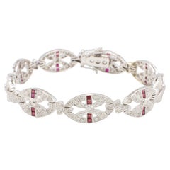 Pulsera de eslabones con diamantes naturales y rubíes en oro blanco de 18 quilates