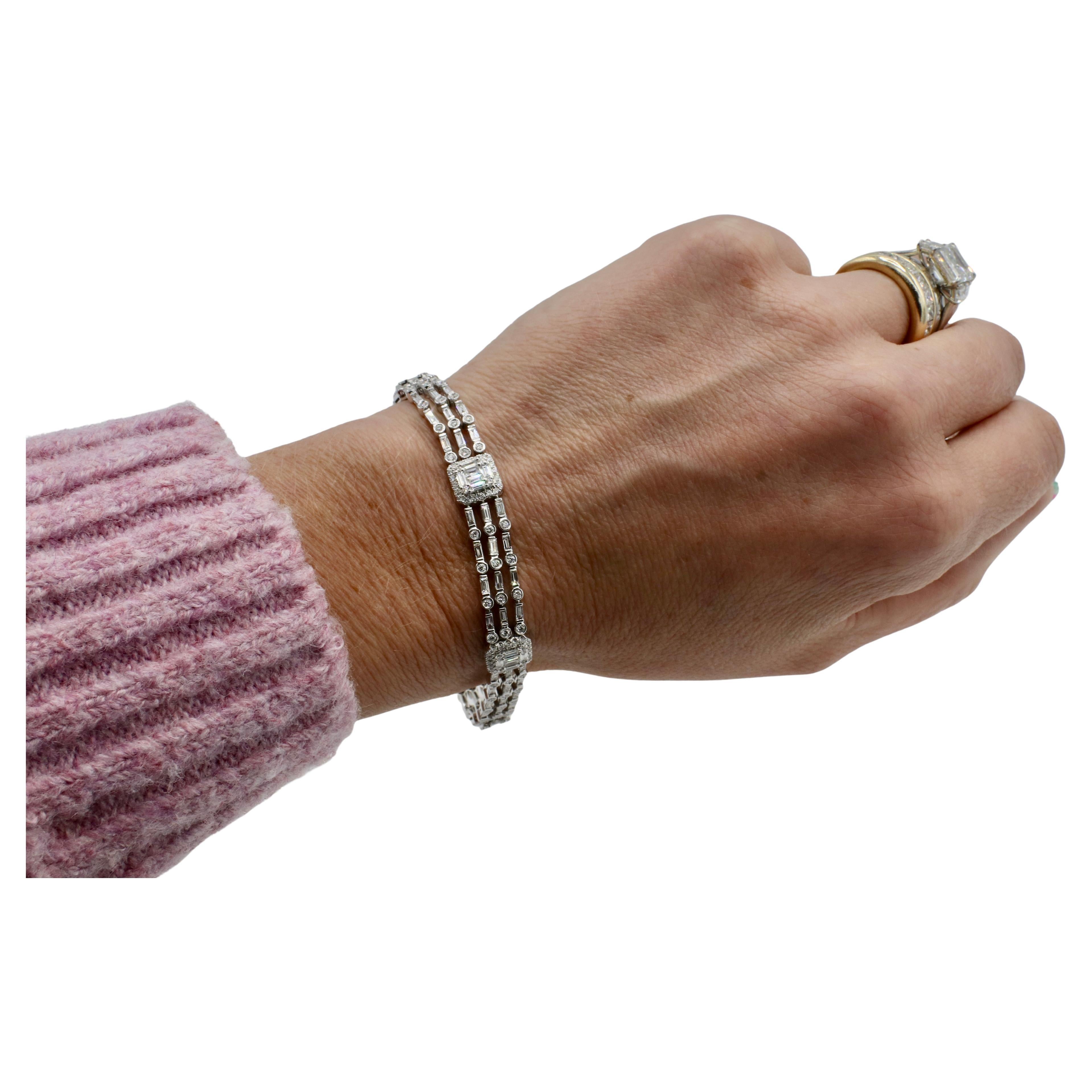 18 Karat White Gold Natural Round & Baguette Diamond Three-Row Tennis Bracelet 

Metal: 18k white gold
Weight: 18.29 grams
Diamonds: Approx. 4.25 CTW round & baguette G-H VS natural diamonds
Length: 7 inches
Width: 8mm
RADD F35000217
