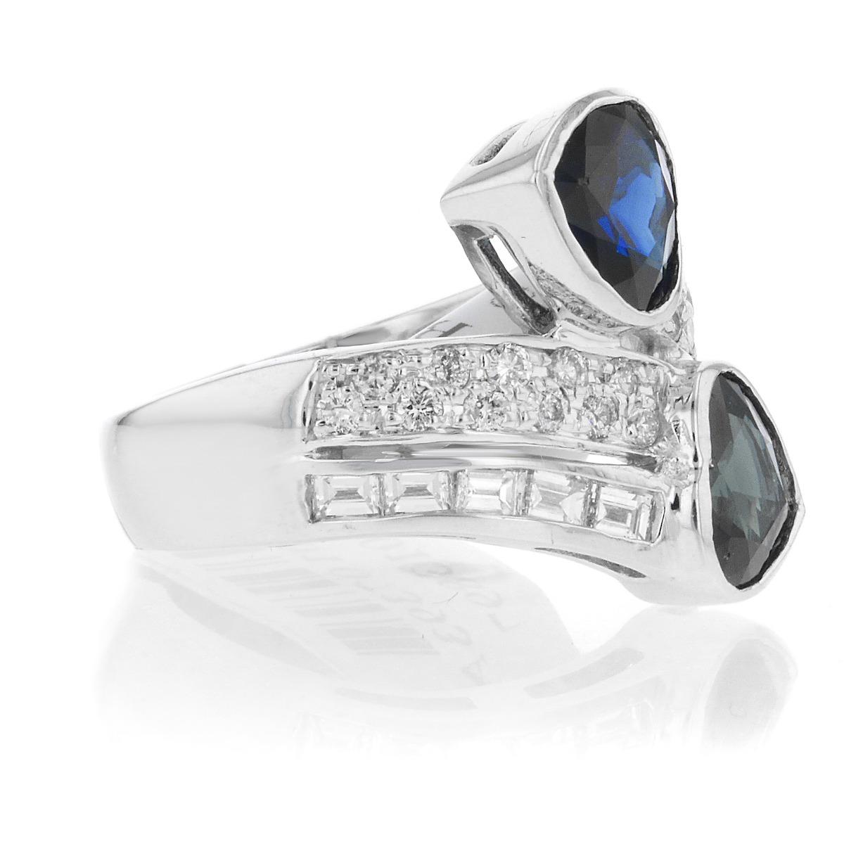18k White Gold Navy Blue and White Diamond Cocktail Ring
7.6 Penny Weight
Approximately 32 Diamonds 
Ring Size: 6.5
Center Stone: Yes
Gemstone: Diamond
Stone Count: 32
Stone Shape: Heart Modified Brilliant 
Color Grade: G-H
Clarity Grade: