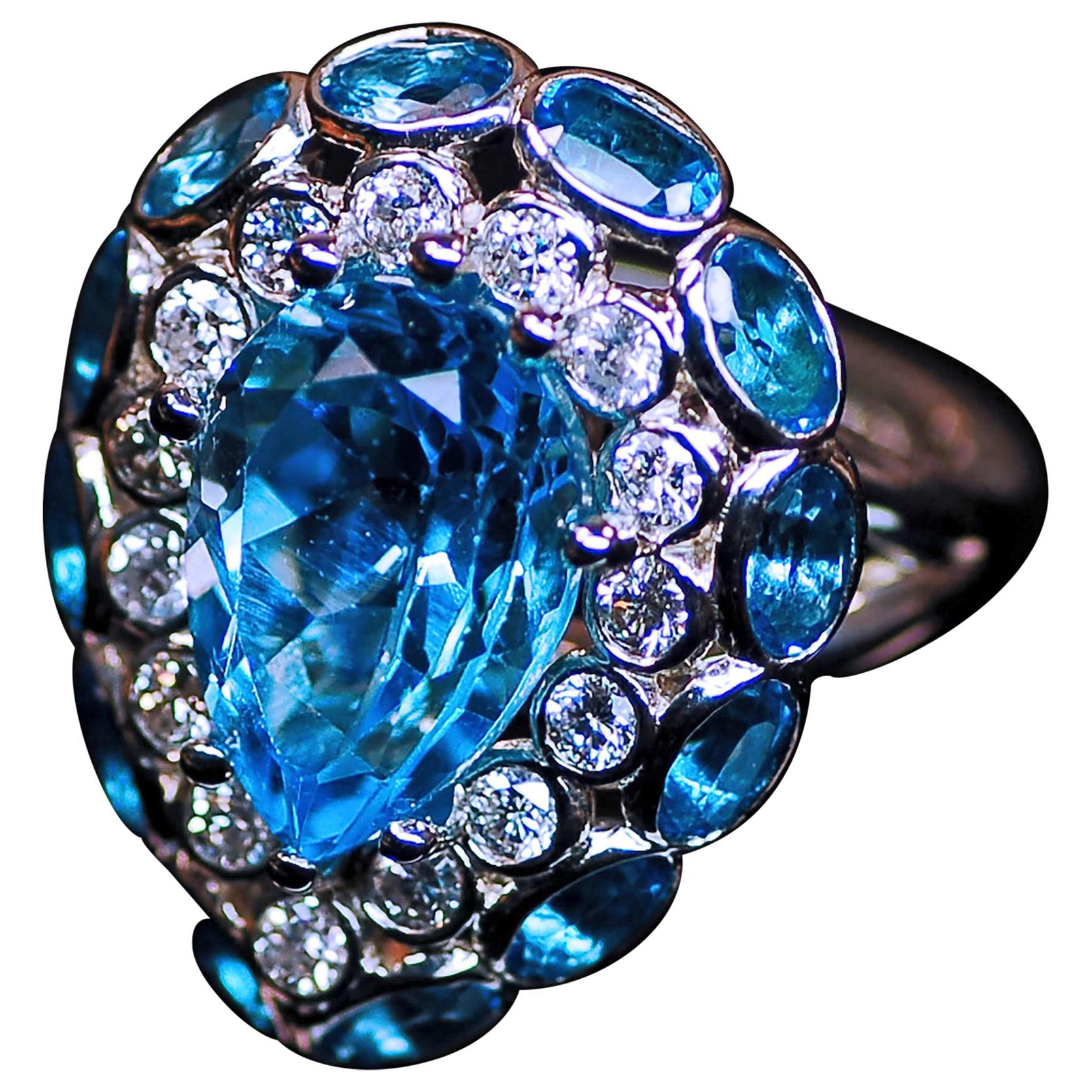 18 Karat White Gold Neon Blue Aquamarines and Diamonds Cocktail Ring For Sale