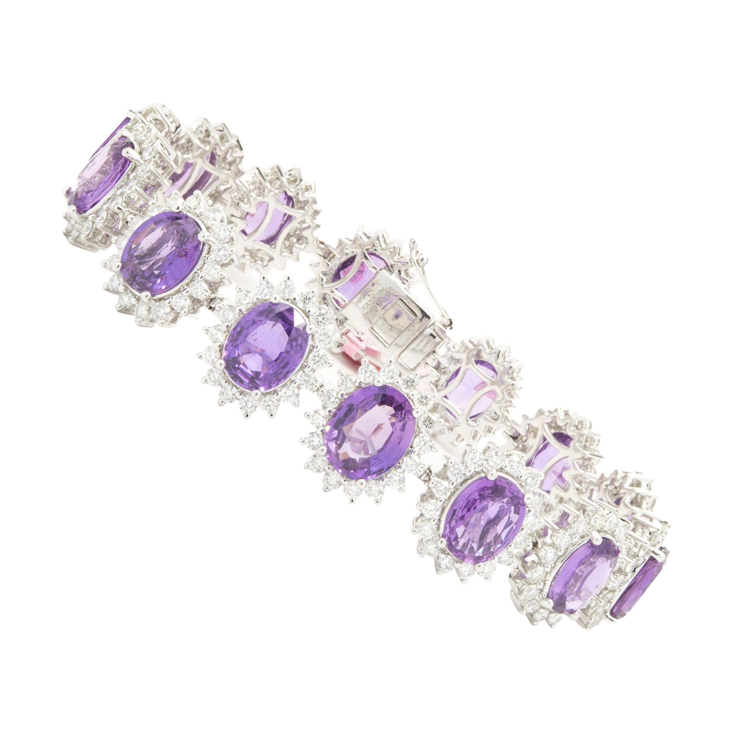 Bracciale in linea con zaffiri viola e diamanti in oro bianco 18 carati senza calore