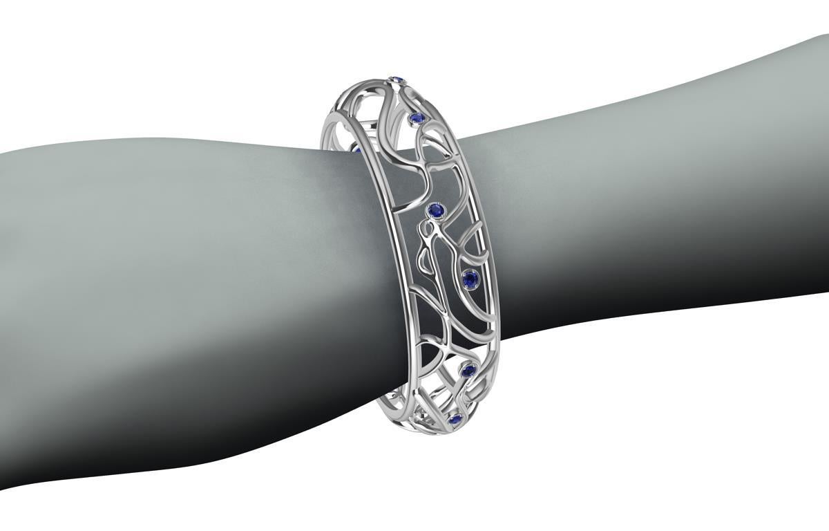 18 Karat White Gold Ocean Sapphires Bangle In New Condition For Sale In New York, NY
