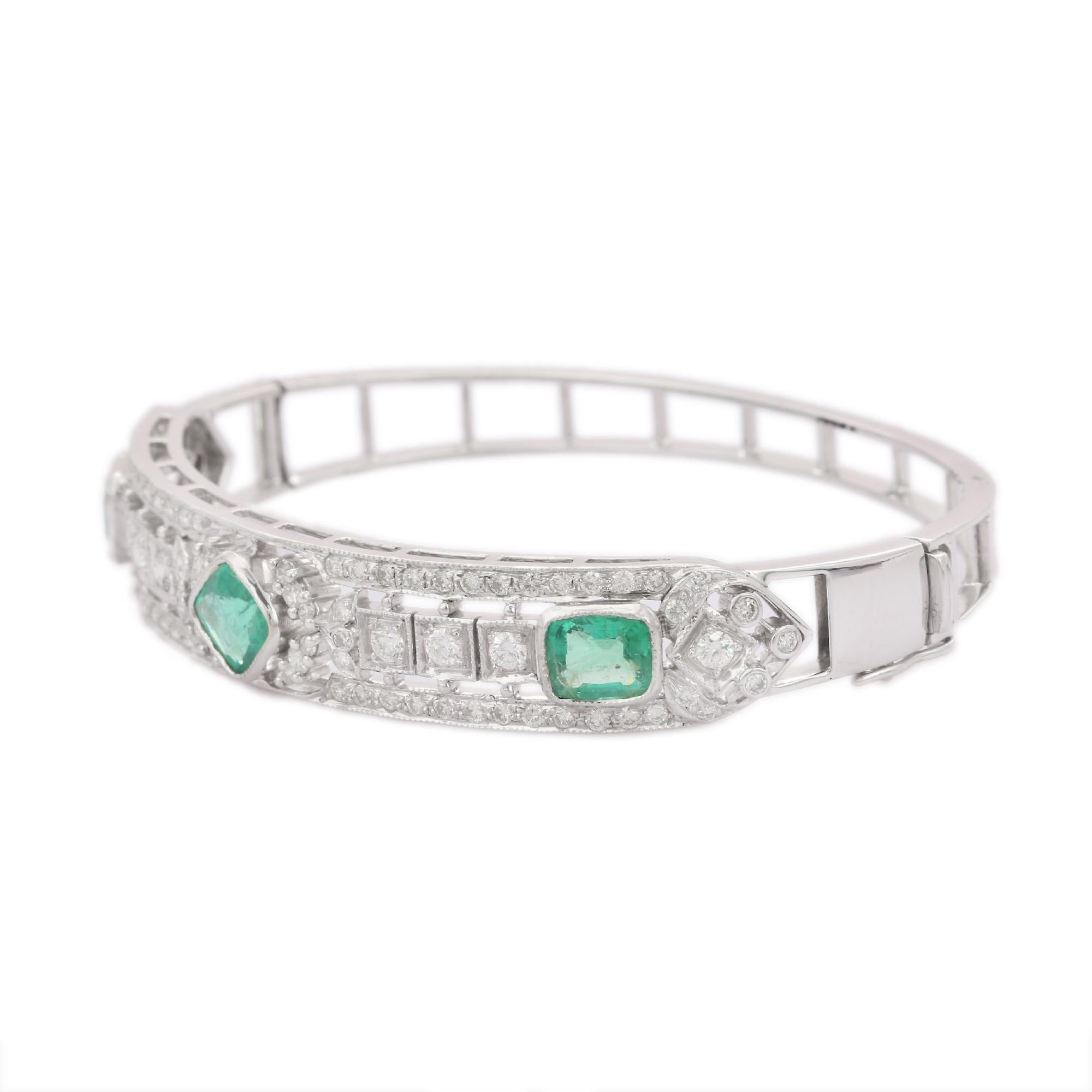 Art Deco 18 Karat Solid White Gold Diamond and Cushion Cut Emerald Clamper Bracelet For Sale