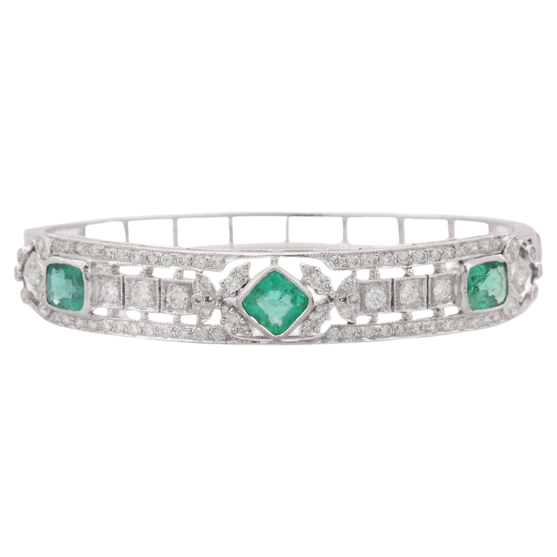 18 Karat Solid White Gold Diamond and Cushion Cut Emerald Clamper Bracelet