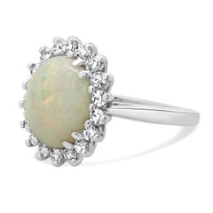 18 Karat White Gold Opal and Diamond Halo Ring