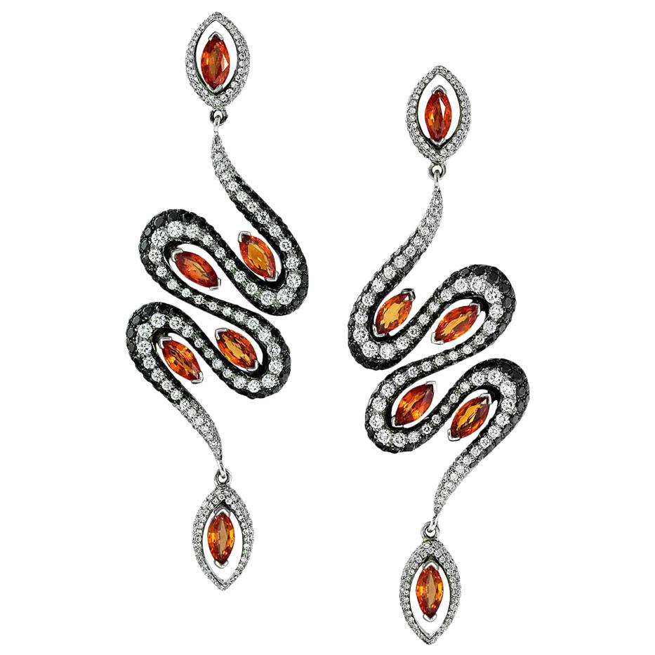 18 Karat White Gold Orange Sapphire and Diamond Signature Earrings by Niquesa For Sale