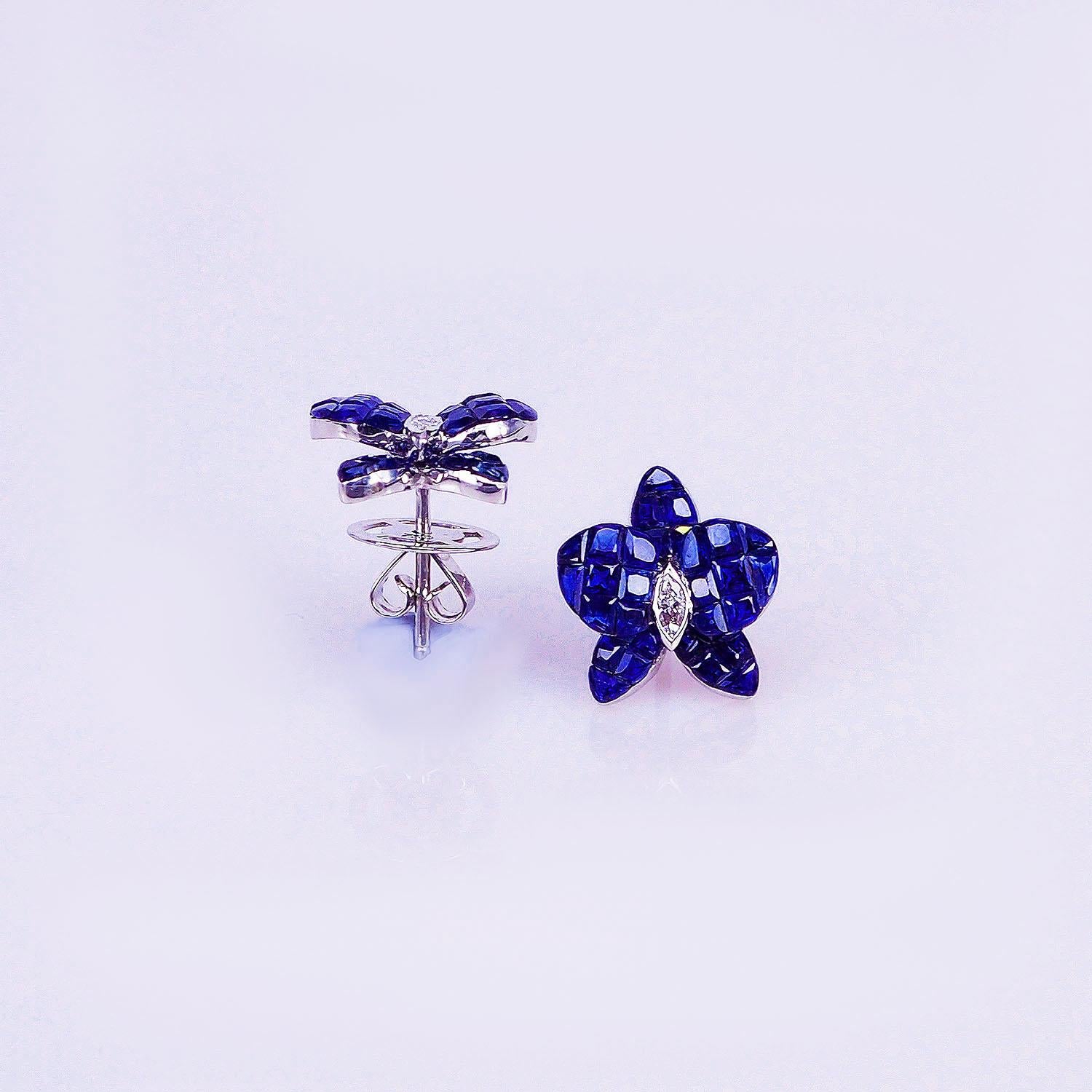 A lovely sapphire stud earrings that you can use as everyday.We use the top quality Sapphire for our invisible setting.It is deep blue and very sparking. The invisible is a highly technique .We set the stone in perfection as we are professional in