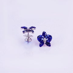 18 Carat White Gold Orchid Flower Sapphire Invisible Stud Earrings
