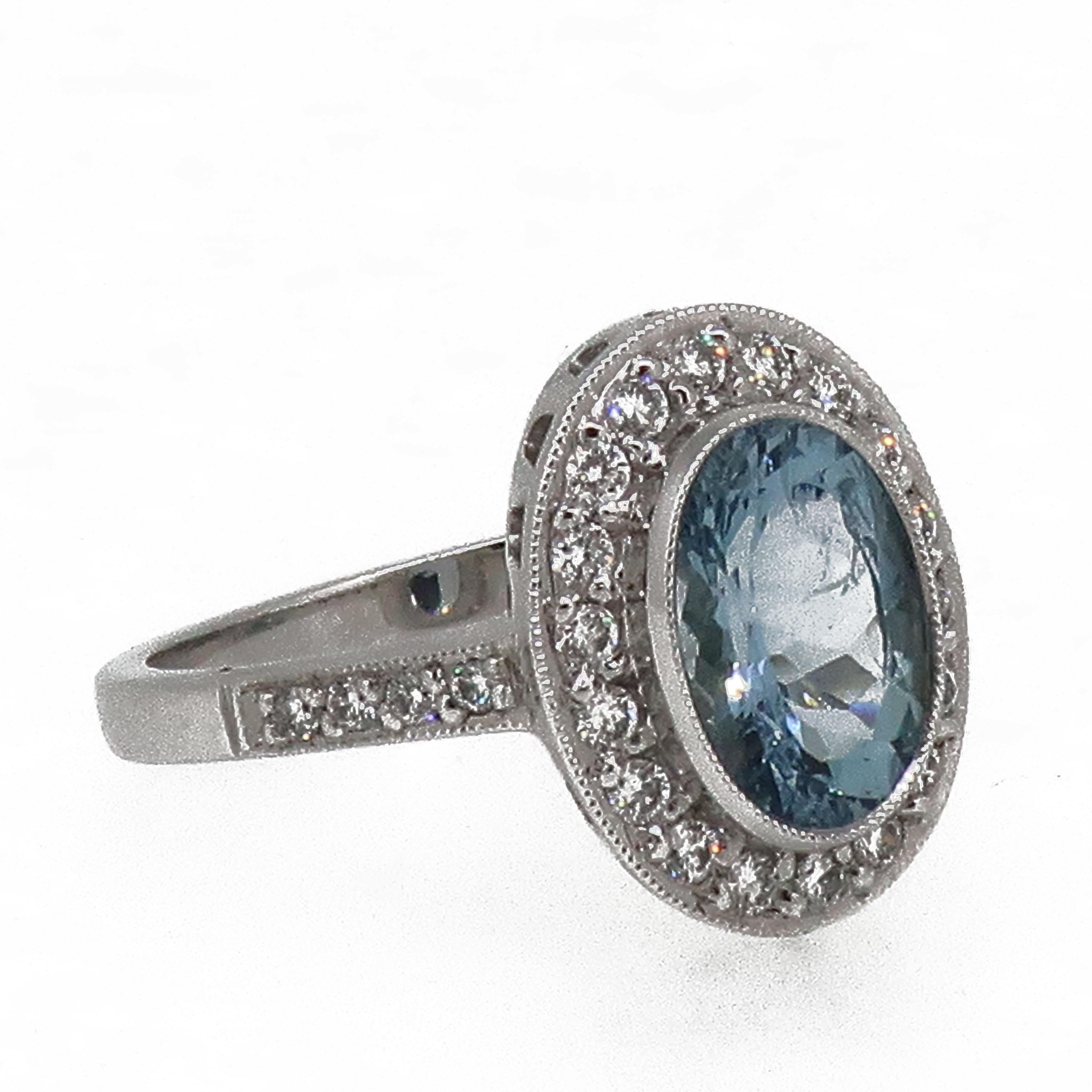Women's 18 Karat White Gold Oval Aquamarine and Diamond Art Deco Style Cluster Ring For Sale