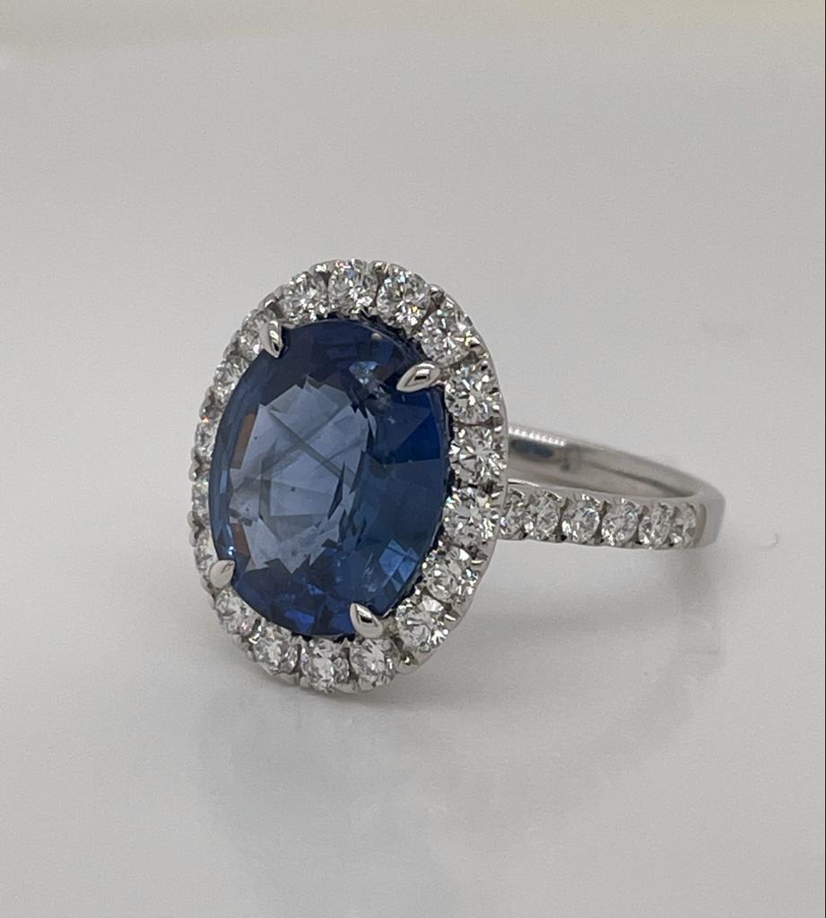 6.70 ct oval Ceylon Sapphire
Measuring (13.0x10.8) mm
30 pieces of round diamonds weighing 1.12 cts
Set in 18K white gold ring
Weighing 5.00 grams