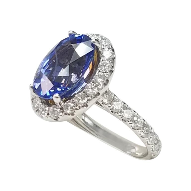 18 Karat White Gold Oval Cut Blue Sapphire and Diamond Ring
6.21 Carats of Blue Sapphires
1.40 Carats of Diamonds
Oval Cut 
18 Karat White Gold 