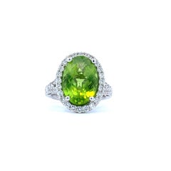 18 Karat White Gold Oval Cut Peridot and Diamond Ring (Ref #17456)