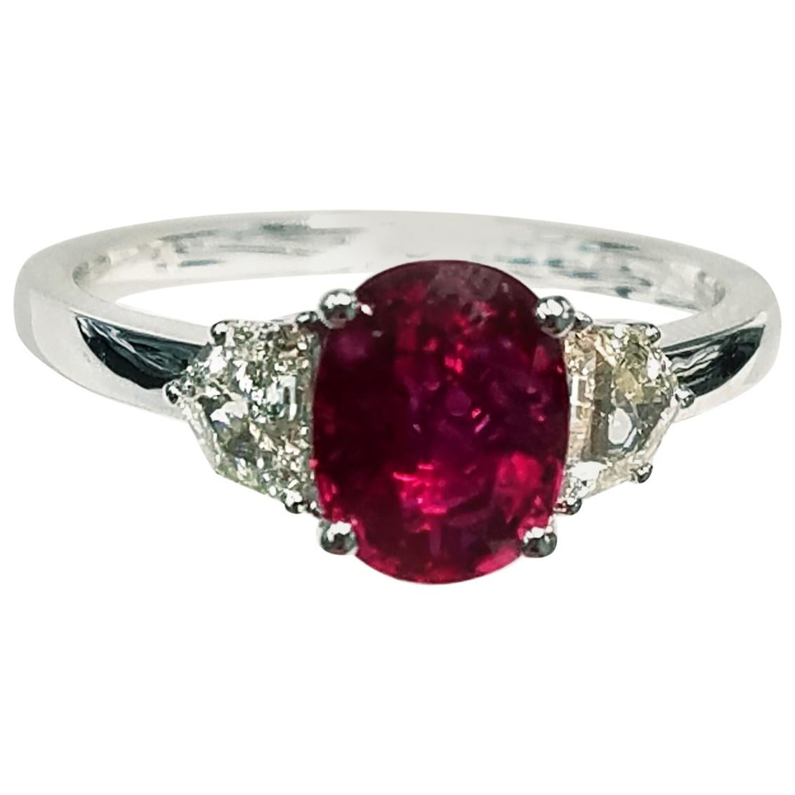 18 Karat White Gold Oval Cut Ruby and Genuine Diamond Ring