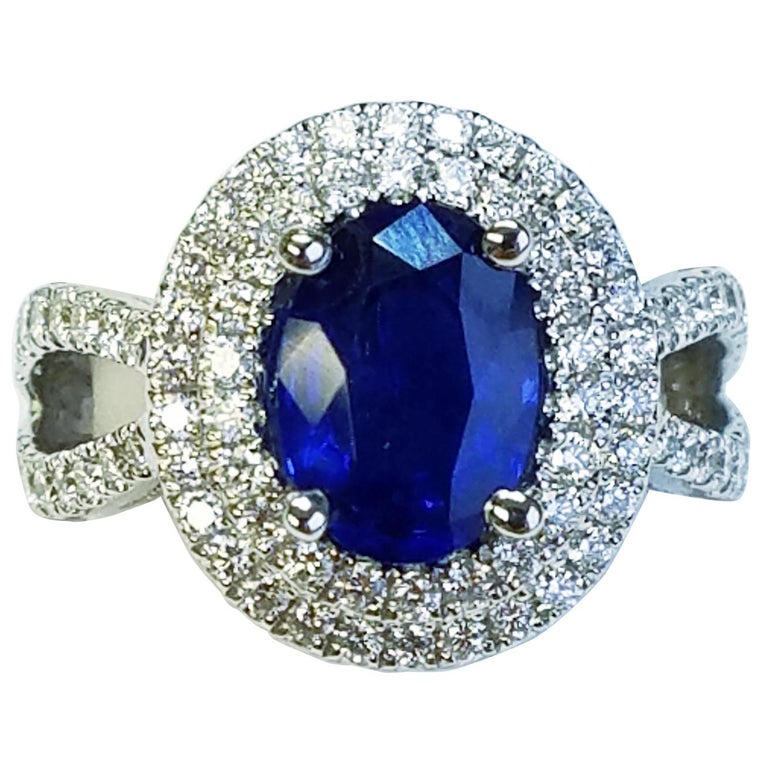 Bague en or blanc, saphir orange décor de saphirs jaunes, diamants