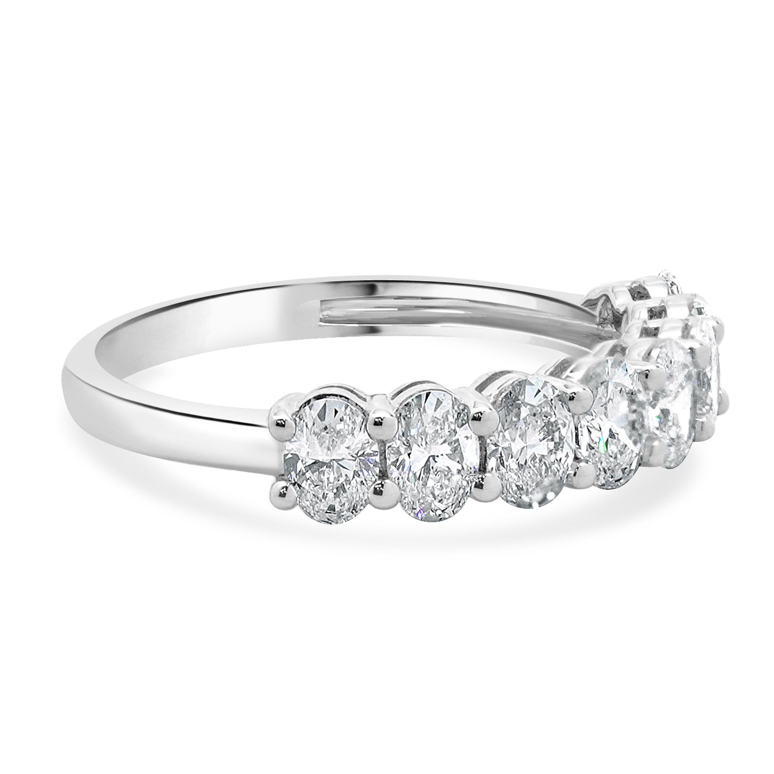 Designer: Custom
Material: 18K white gold
Diamonds: 8 oval cut = 1.28cttw
Color: H / I
Clarity: SI1
Size: 6.5 sizing available 
Dimensions: ring top measures 3mm in width
Weight: 2.54 grams
