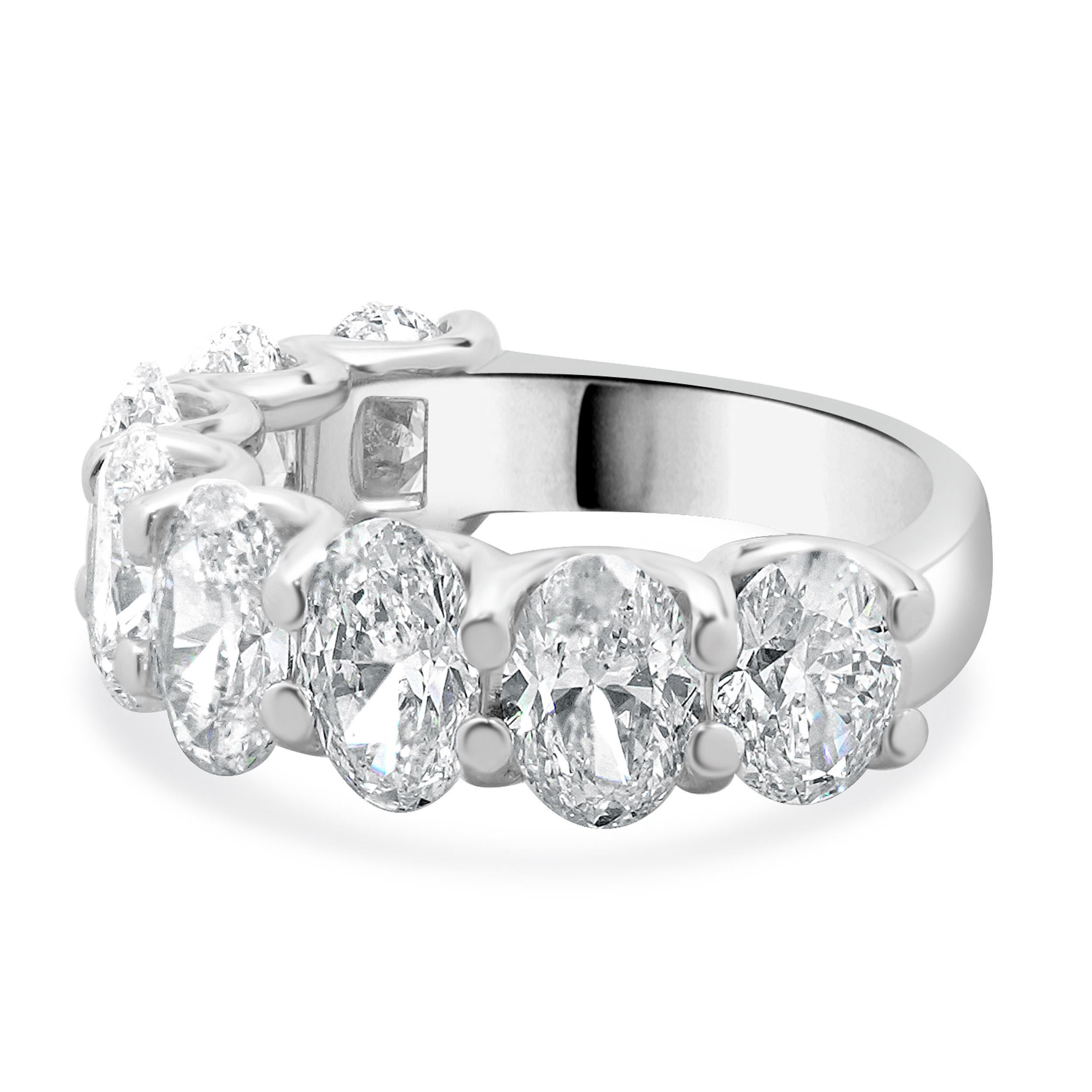 Designer: custom
Material: 18K white gold
Diamond: 8 oval cut = 6.10cttw
Color: G/H
Clarity: VS2-SI1
Ring size: 6.5 (please allow two additional shipping days for sizing requests)
Weight: 7.54 grams
