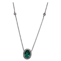 18 Karat White Gold Oval Emerald
Diamond Necklace 18 Karat White Gold Oval Emerald
Diamond Necklace