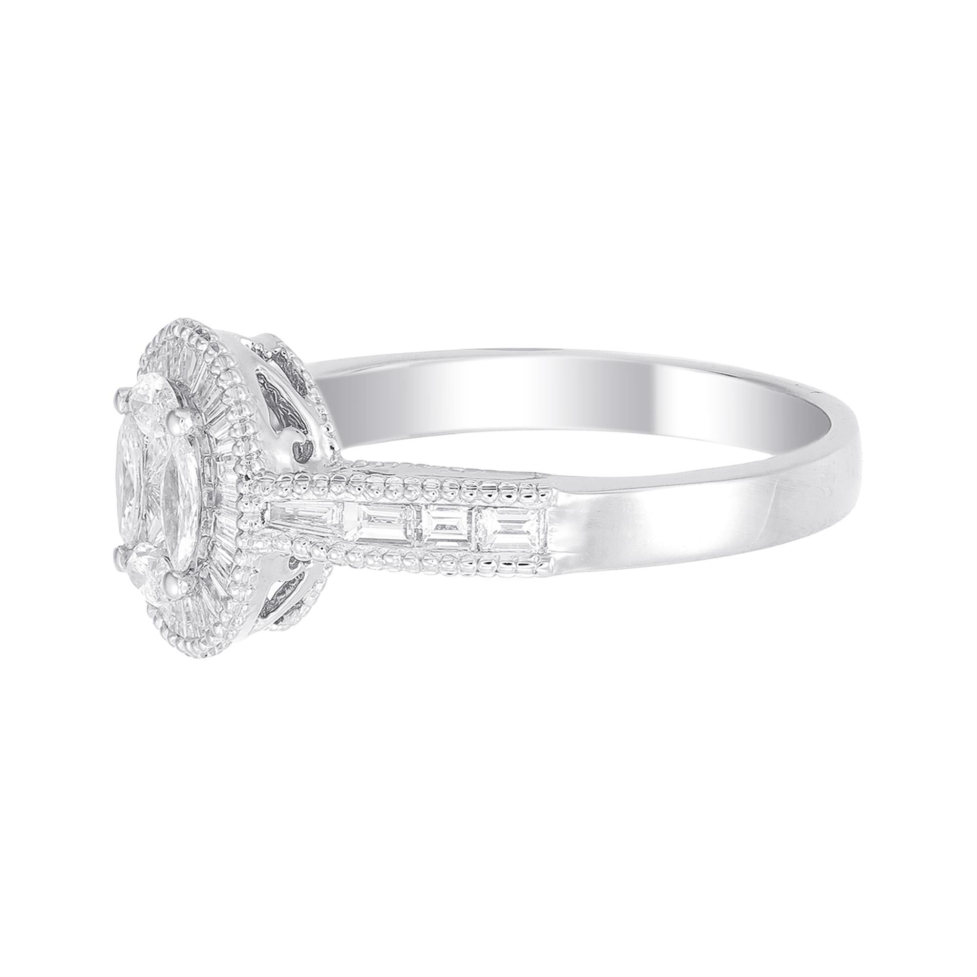 This 18K White Gold cocktail ring features a luscious Oval shape White Diamond Illusion, accentuated by a halo of Baguette Cut diamonds. Combine with glamorous outfits for a show-stopping effect. Each diamond hand-selected by our experts for its
