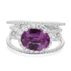 18 Karat White Gold Oval Pink Sapphire and Diamond Bypass Style Ring
