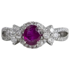18 Karat White Gold Oval Ruby and Diamond Halo Fashion Ring