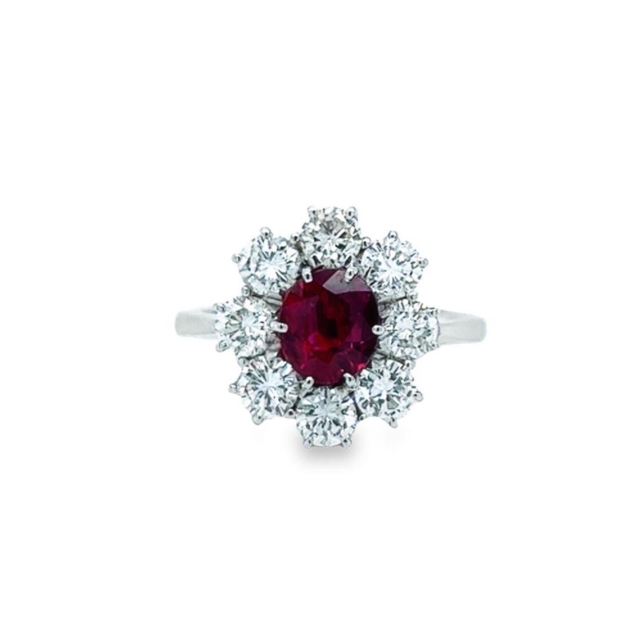 Oval Cut 18 Karat White Gold Oval Ruby Round Diamond Cocktail Ring For Sale