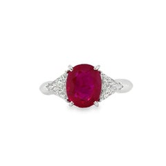 Used 18 Karat White Gold Oval Ruby Trillion Diamond Cocktail Ring