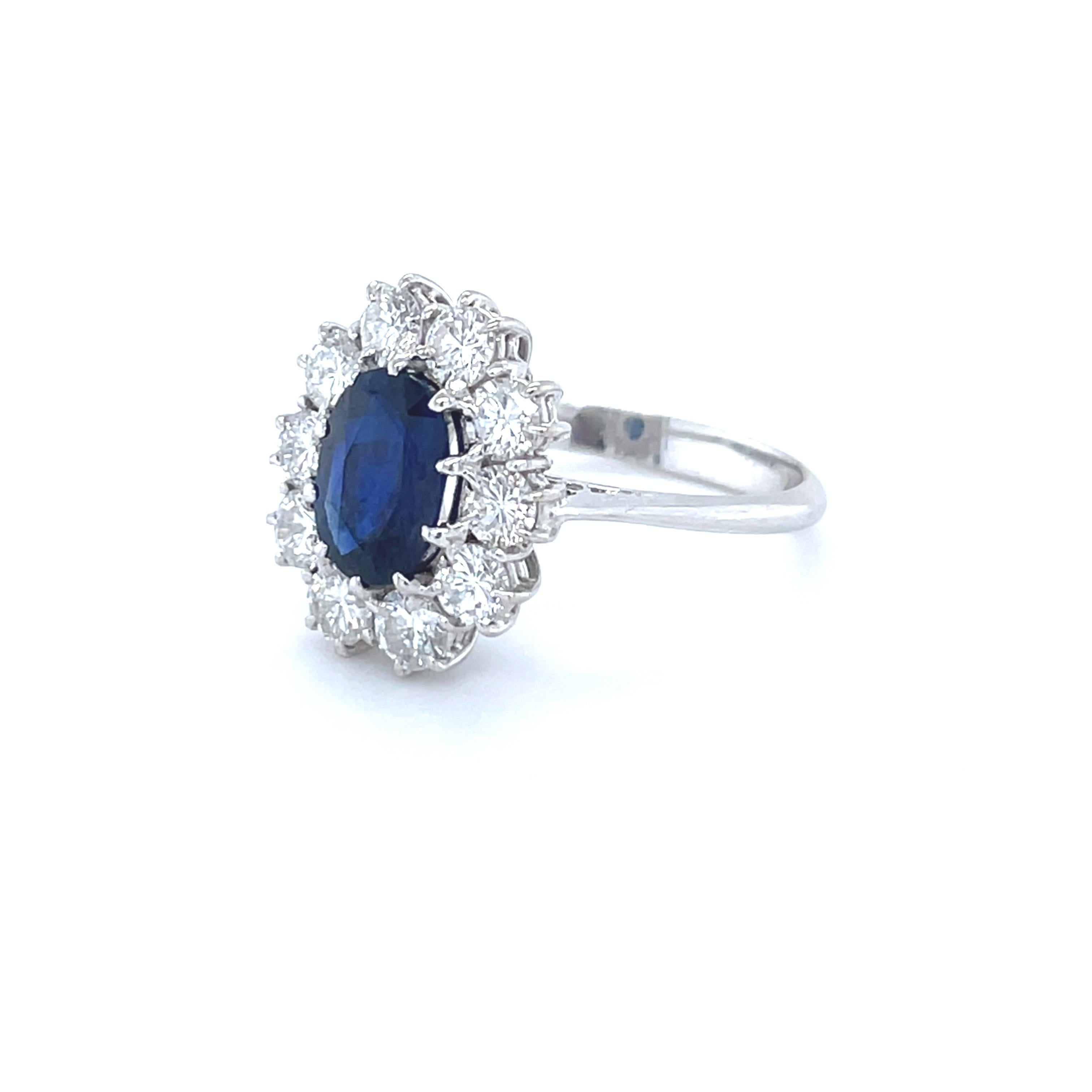 Women's 18 Karat White Gold Oval Sapphire Diamond Cocktail Ring For Sale