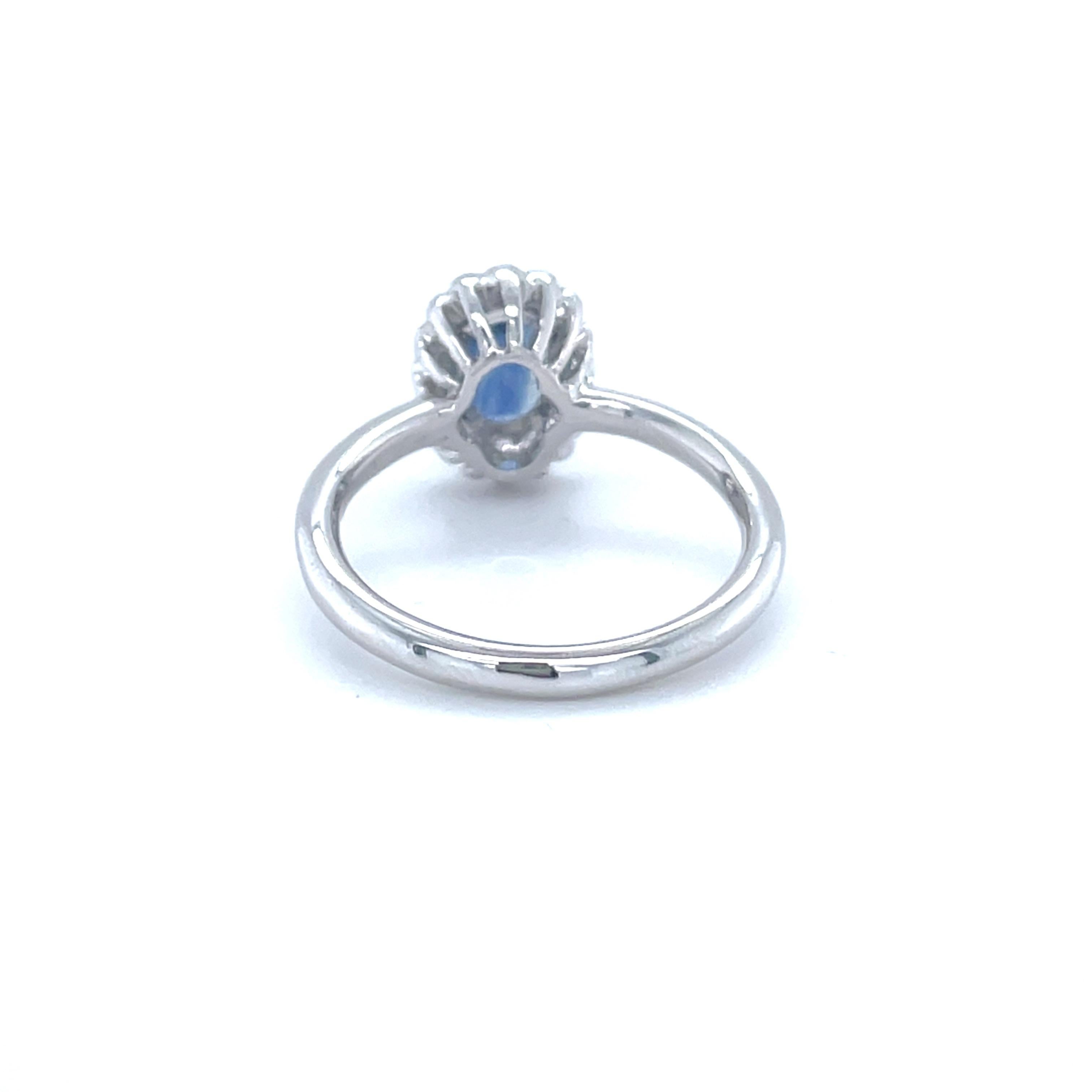 Women's 18 Karat White Gold Oval Sapphire Diamond Cocktail Ring For Sale