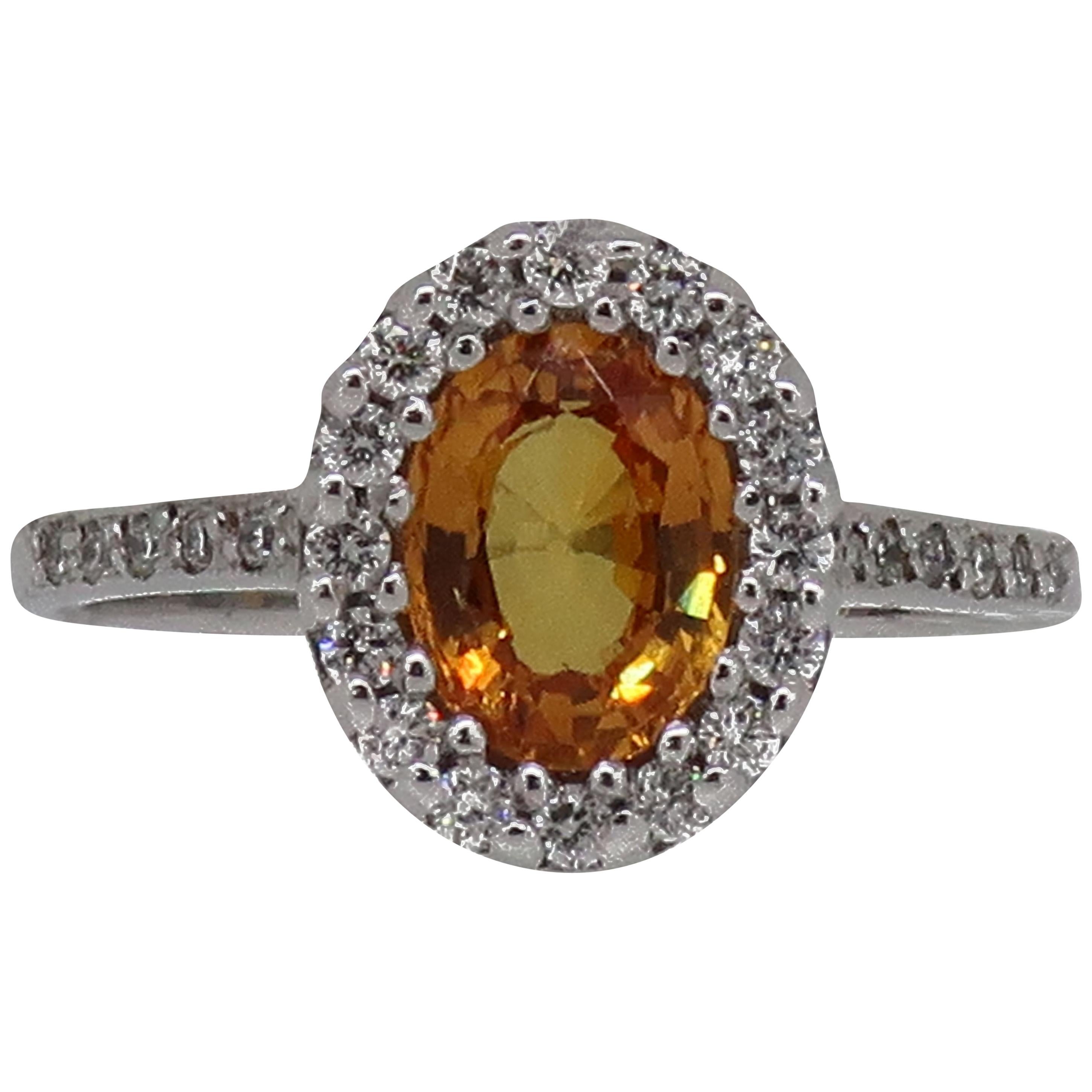 18 Karat White Gold Oval Yellow Sapphire and Diamond Halo Cluster Ring For Sale