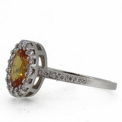 18 Karat White Gold Oval Yellow Sapphire and Diamond Halo Cluster Ring