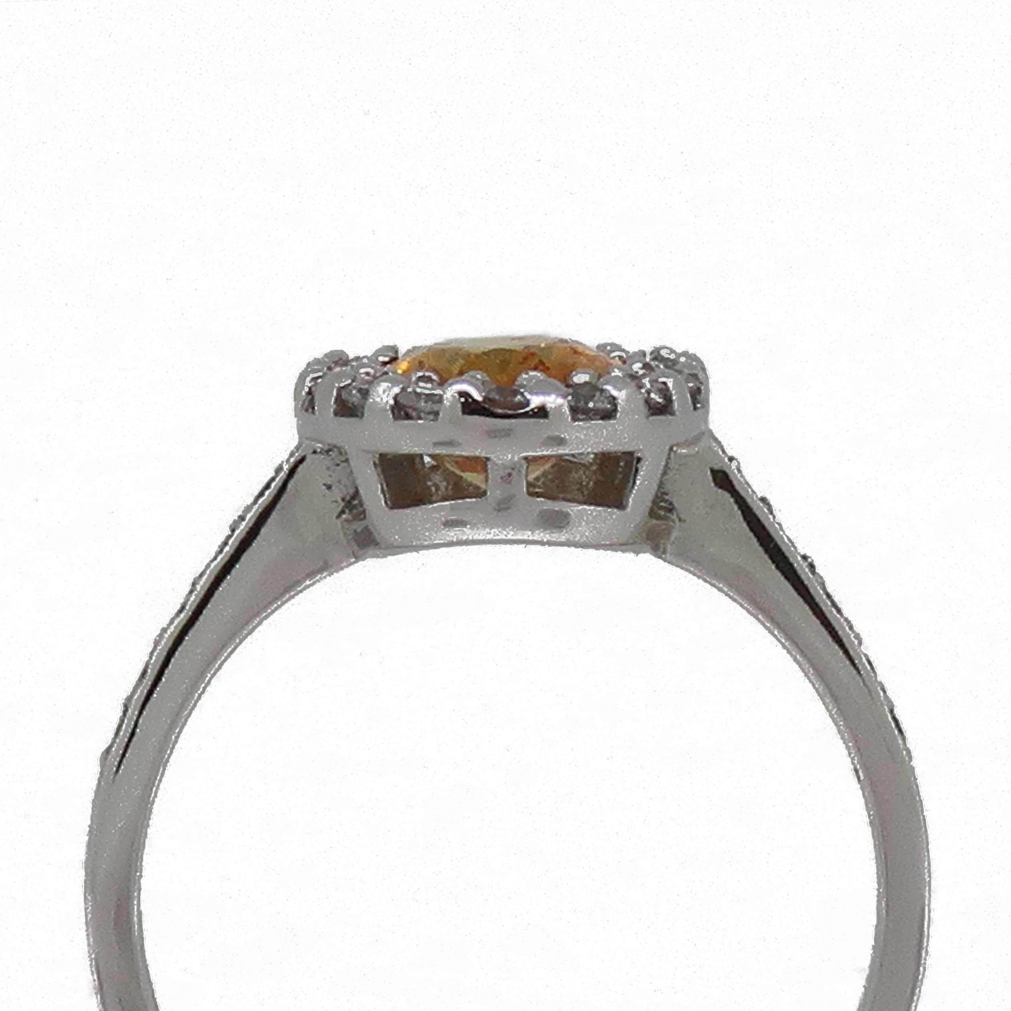 18 Karat White Gold Oval Yellow Sapphire and Diamond Halo Cluster Ring For Sale 1