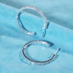 18 Karat White Gold Paraiba and Diamond Hoop Earrings