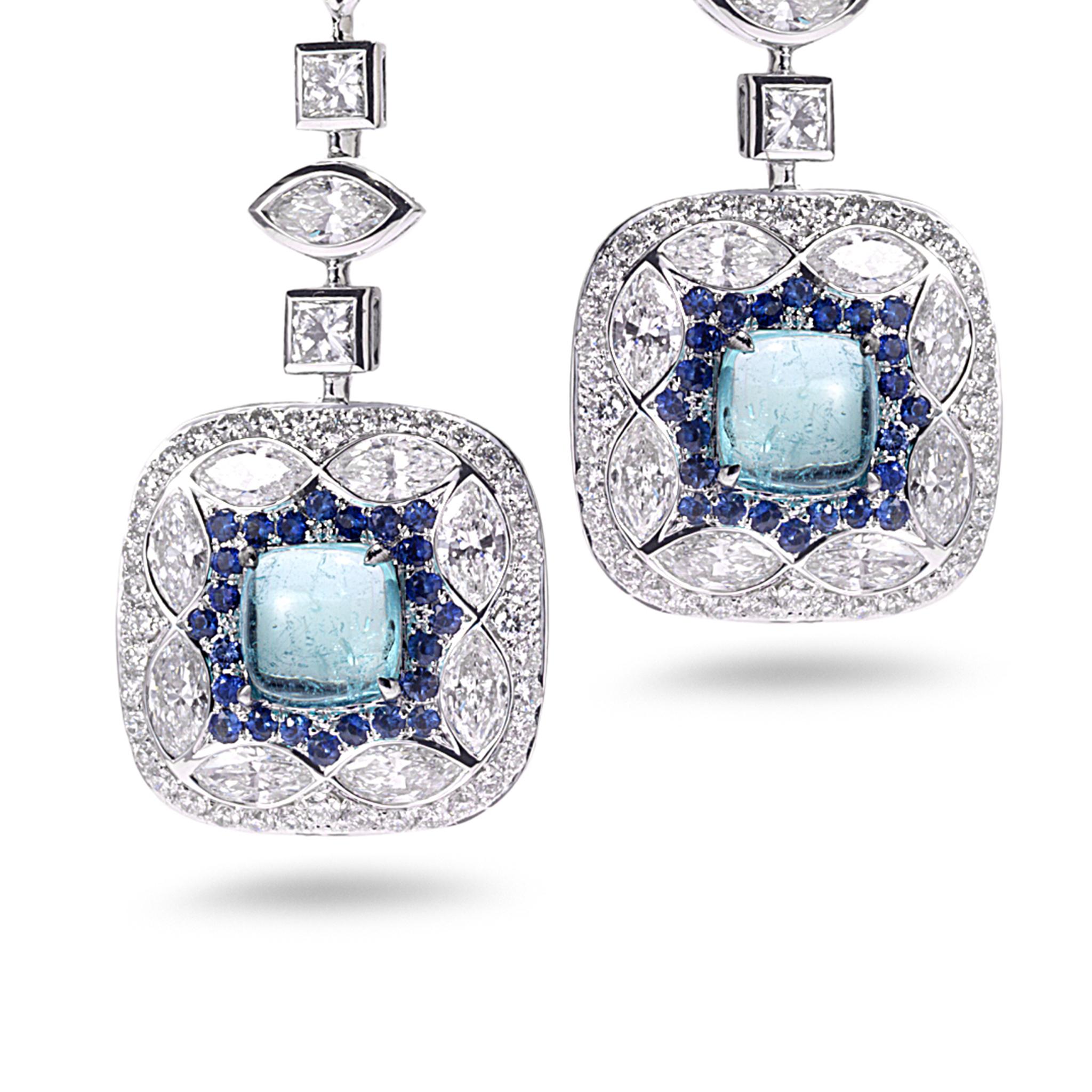 Trinity collection drop earrings set in 18K white gold with 2.17cts paraiba, 0.39cts blue sapphire and 3.87cts diamond.
