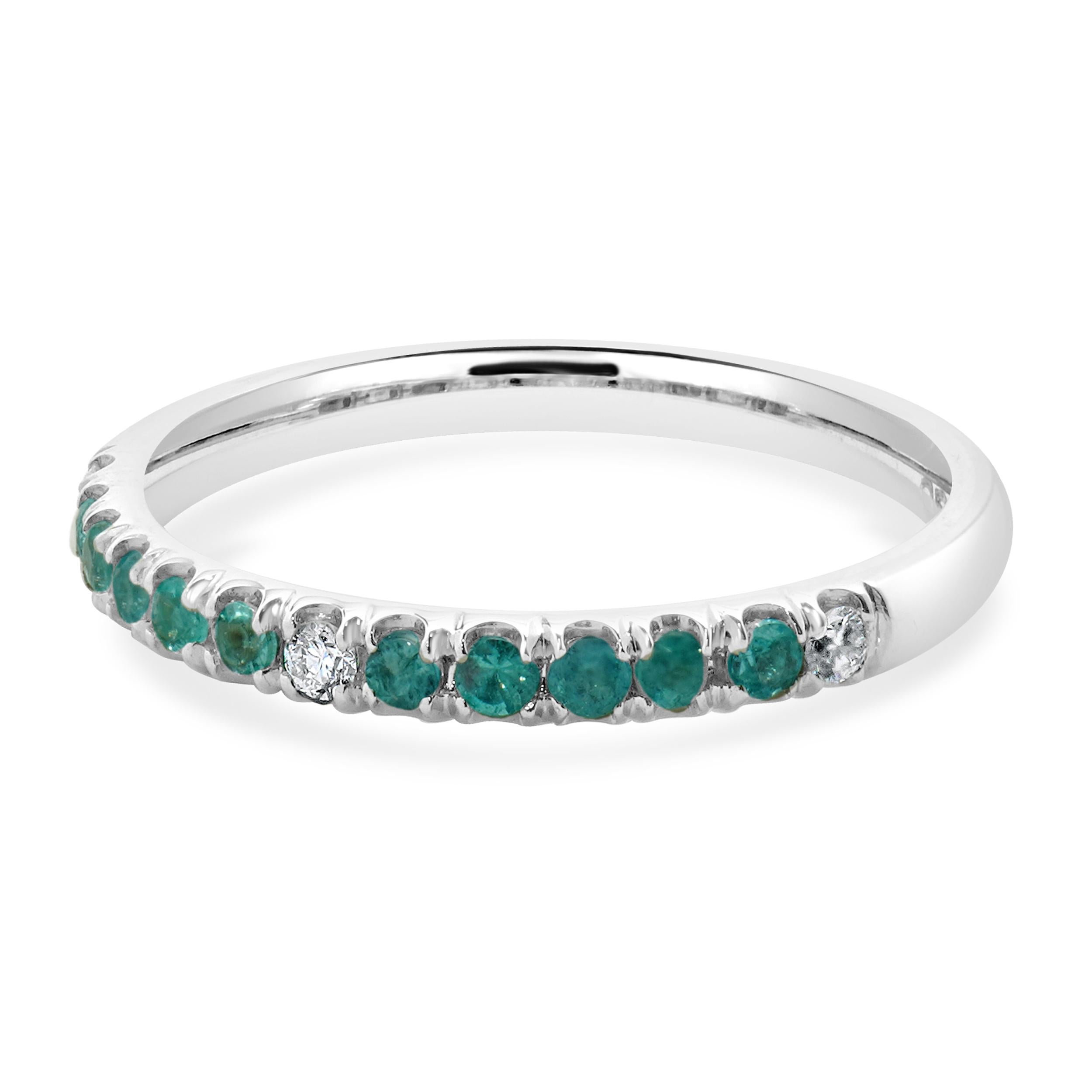 Material: 18K white gold
Diamond: 3 round brilliant cut = .07cttw
Color: G
Clarity: VS2
Paraiba Tourmaline: 10 round cut = .22cttw
Ring Size: 7 (please allow up to 2 additional business days for sizing requests)
Dimensions: ring top measures