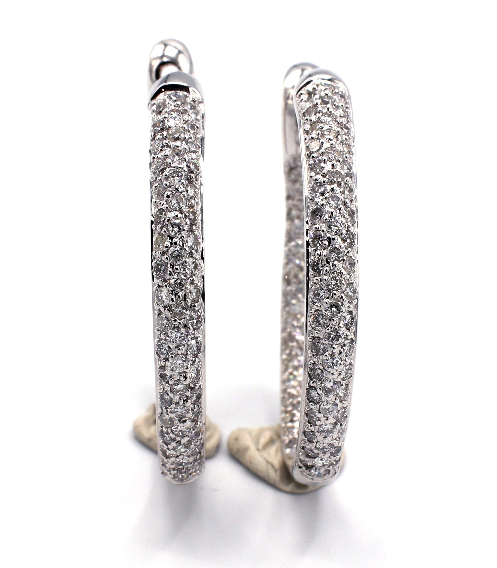 18 Karat White Gold Pave Diamond 2 Carat Hoop Earrings 
Metal: 18k white gold
Weight: 11.47 grams
Diamonds: Approx. 2 CTW G-H VS
Length: 31.5 MM
Diameter: 27MM
Width: 3.6MM
